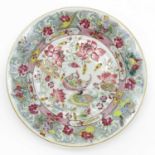 A Beautifully Decorated Famille Rose Plate