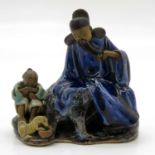 Asian Sculpture Depicting Father and Child