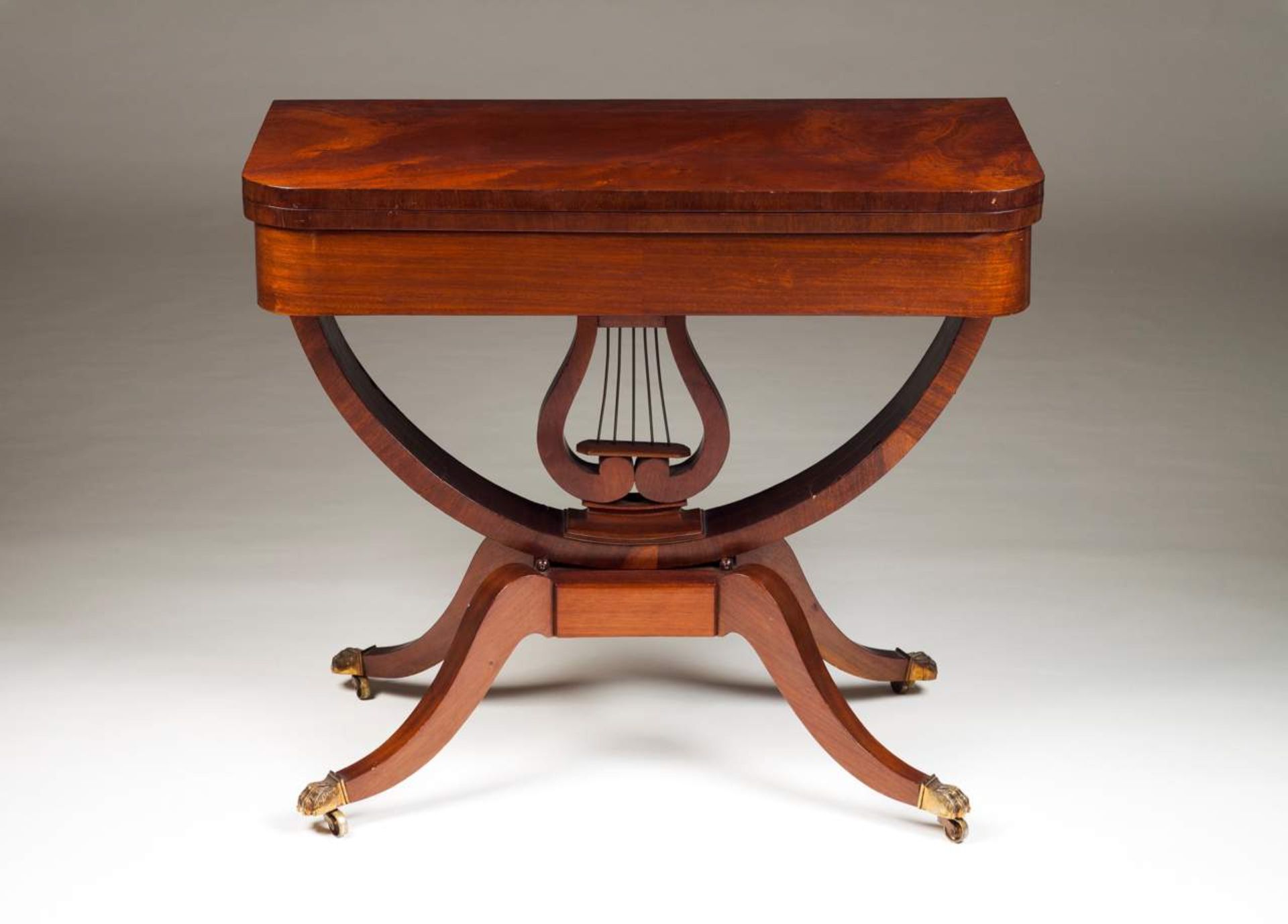 A pair of Empire style card tables Mahogany and burr-mahogany Four claw feet with castors Pierced - Image 2 of 2