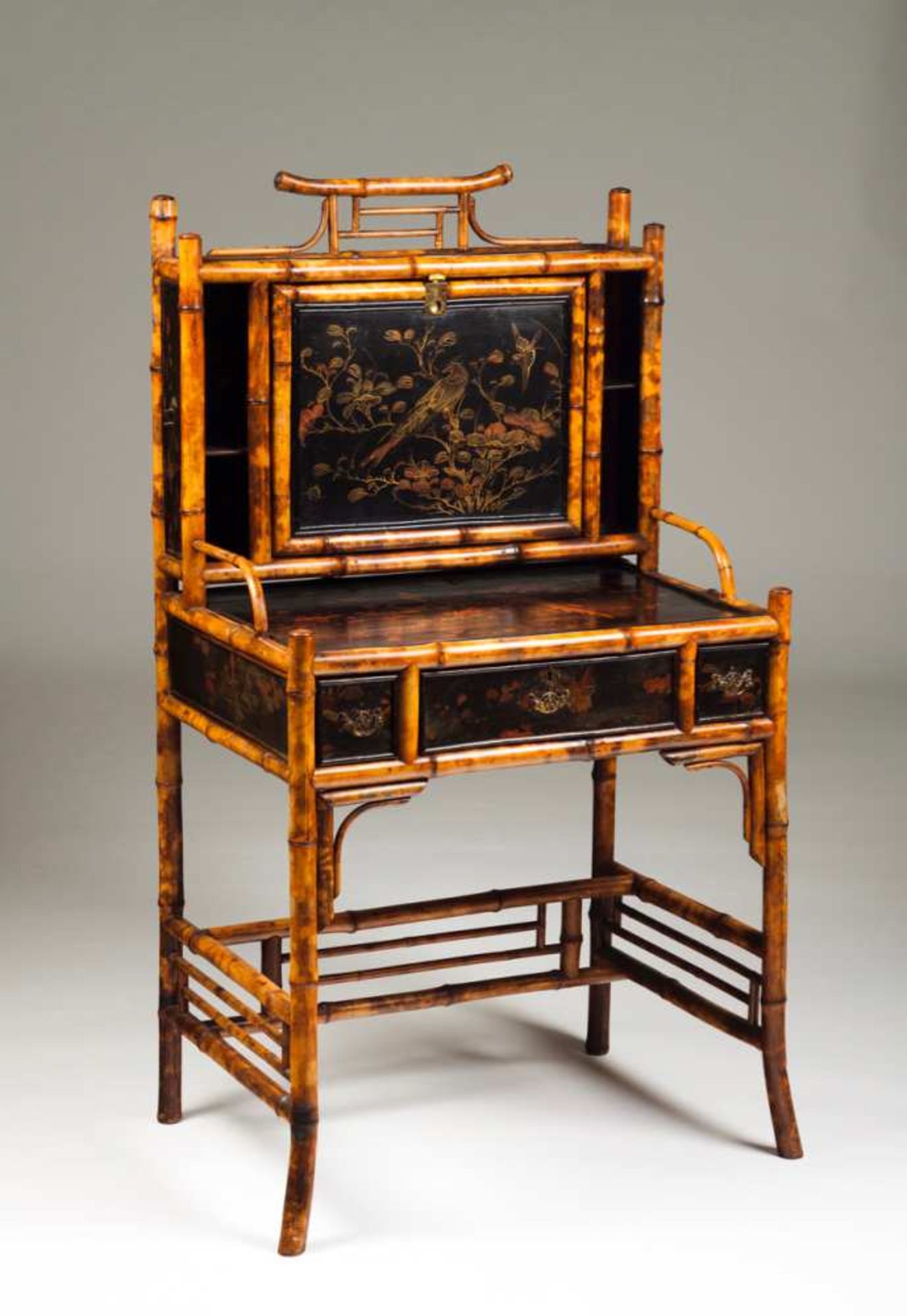 A bureau Bamboo and lacquered wood with polychrome decoration depicting flowers and bird Three