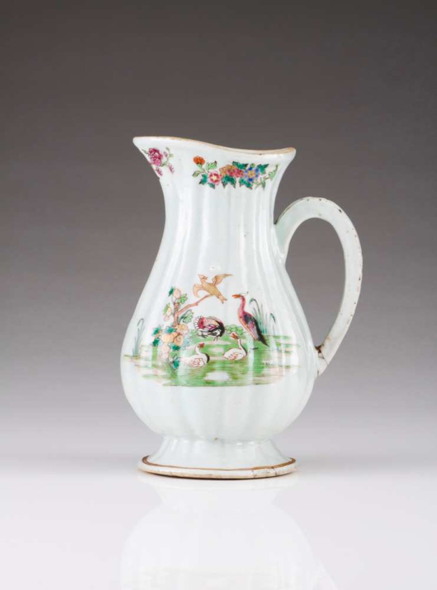 A jug Chinese export porcelain Famille Rose decoration with flowers and animals Qianlong Period (
