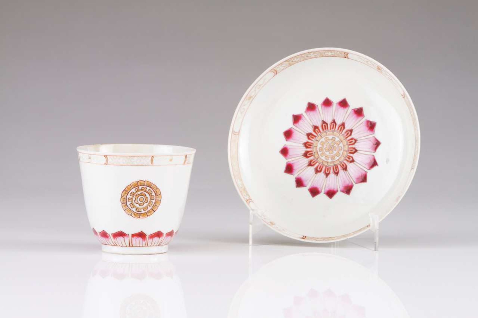 Cup and saucer Chinese export porcelain Polychrome and gilt decoration depicting floral motifs