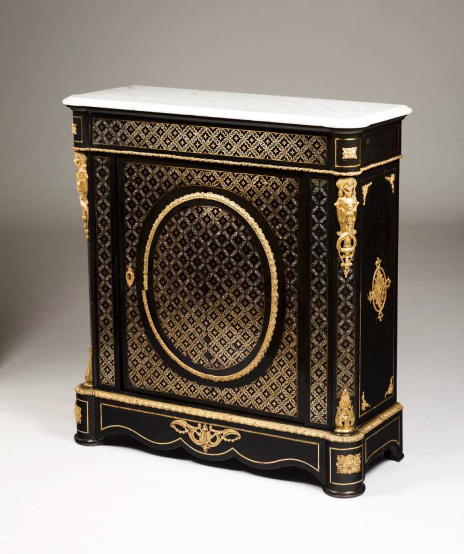 A Napoleon III cabinet, Boulle style Ebonized wood Mother-of-pearl and gilt metal inlaid