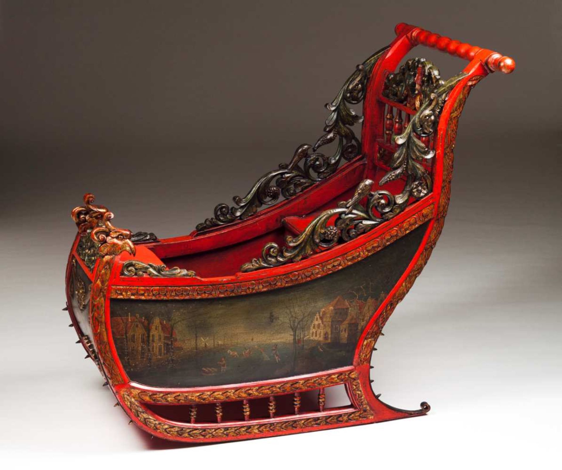 A children sled Painted and gilt wood Turned handle, carved back with figure at the centre and - Bild 3 aus 10