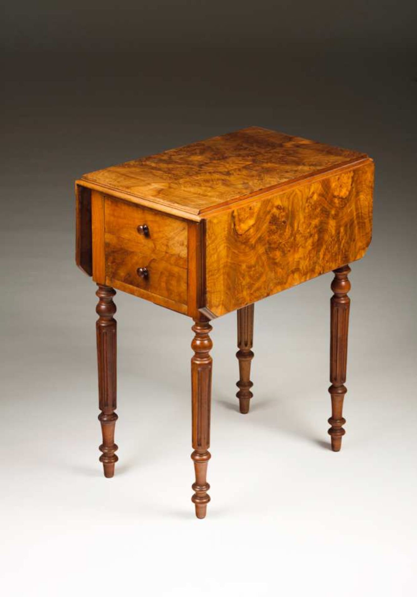 A small George III twin flat top table Burr-walnut Two drawers on one side and tilting drawer on the