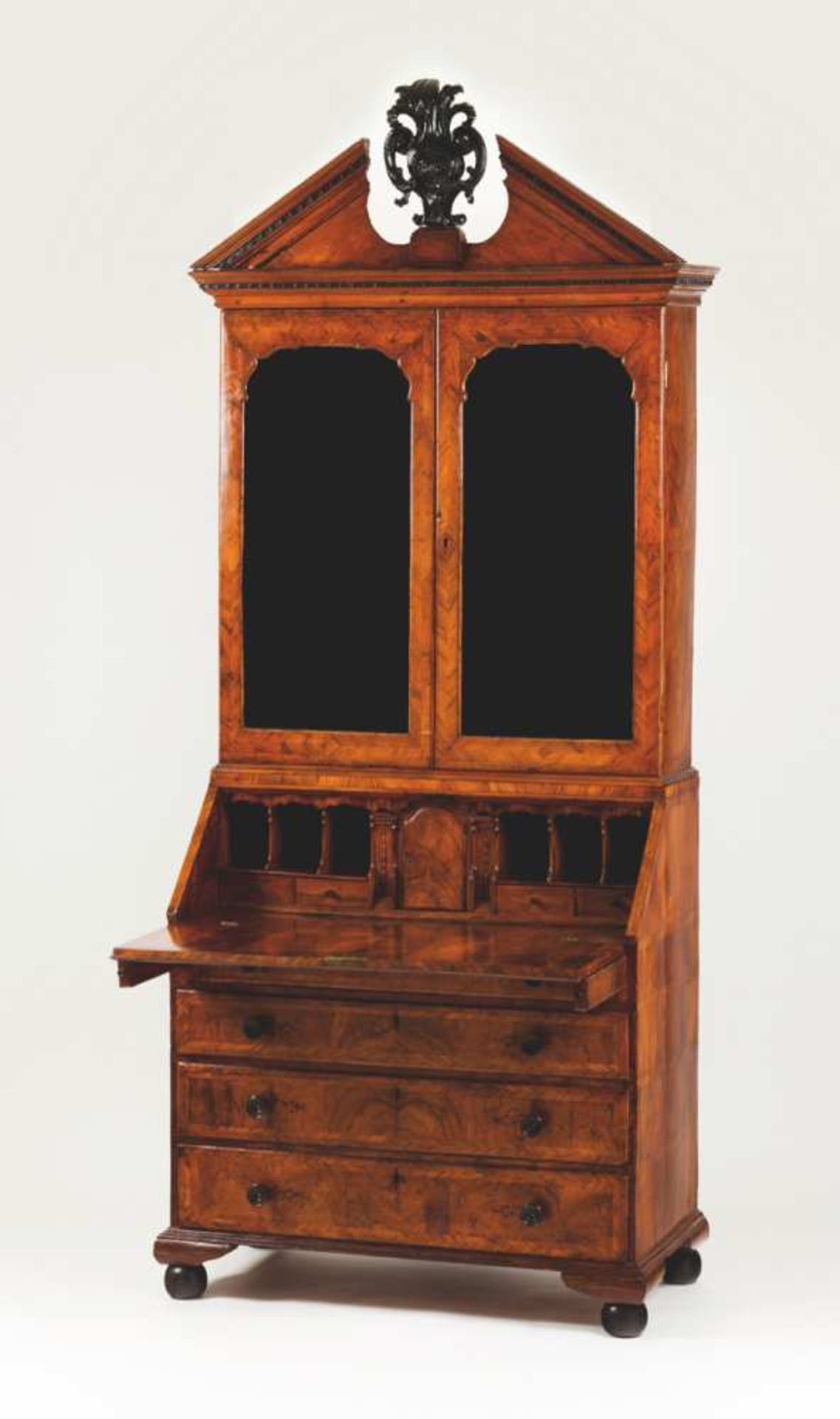 A George III bureau-cabinet Walnut veneered Bureau with ball feet, four drawers and interior with