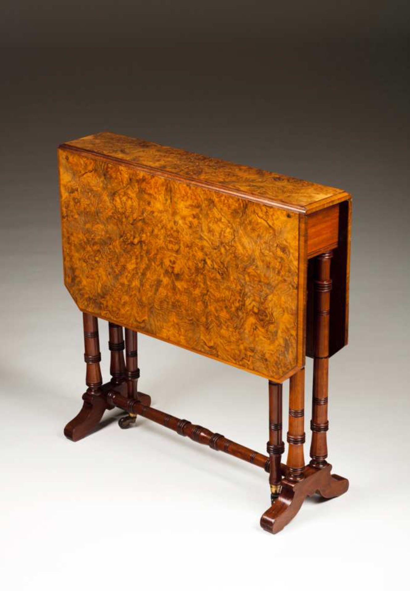 A small twin flat top table Walnut and burr-walnut Turned legs and stretchers, spider-legs with