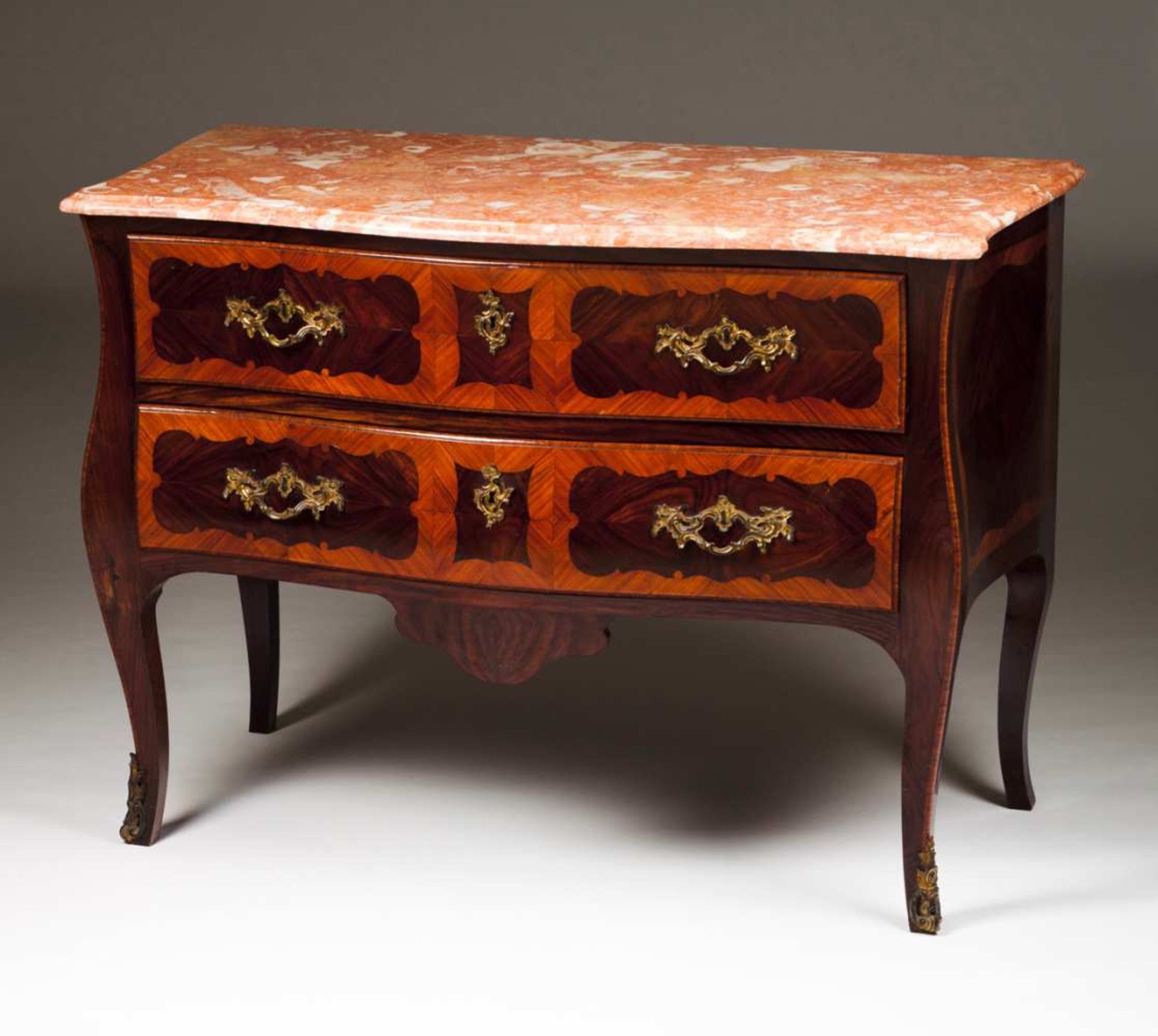 A Louis XV style commode Rosewood with marquetry decoration Two drawers and gilt bronze mounts