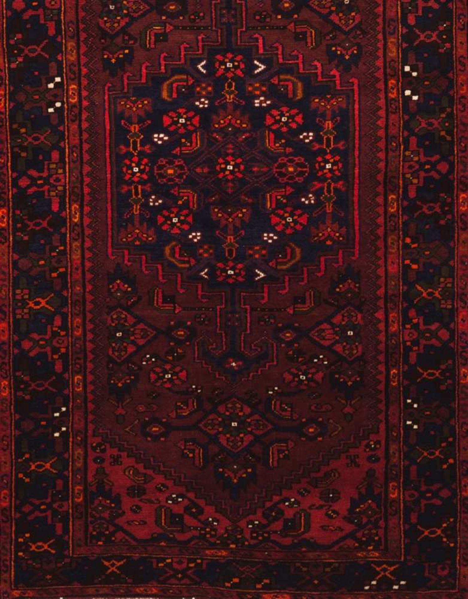 An Oriental carpet Cotton and wool Floral decoration in red, blue, green and orange 260x140 cm