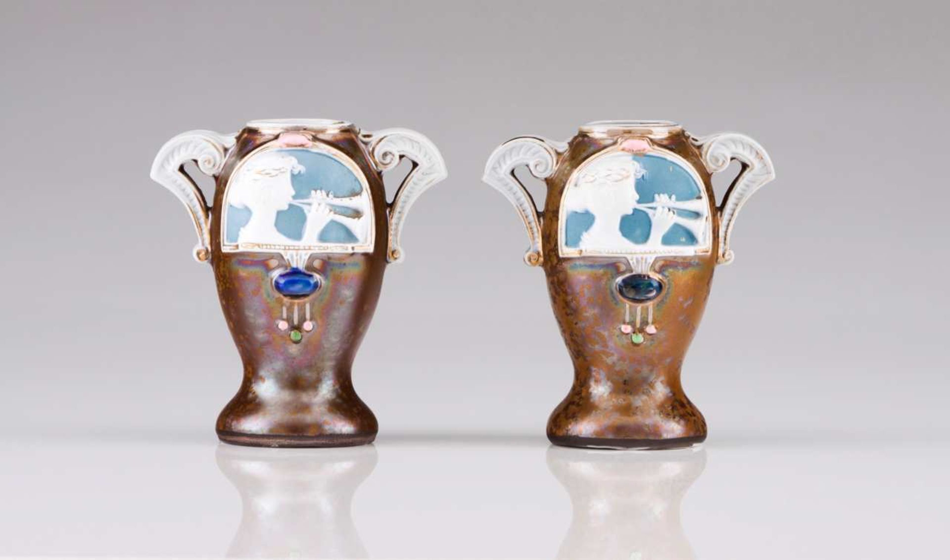 A pair of Art Nouveau vases French majolica Polychrome, glazed and relief decoration Height: 10,5