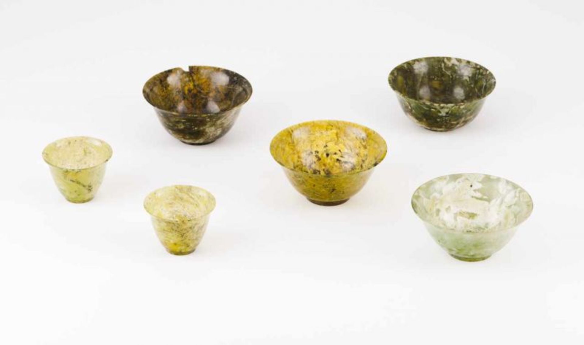 A set of four bowls Jade China, 20th century (losses and defects) 5x10 cm