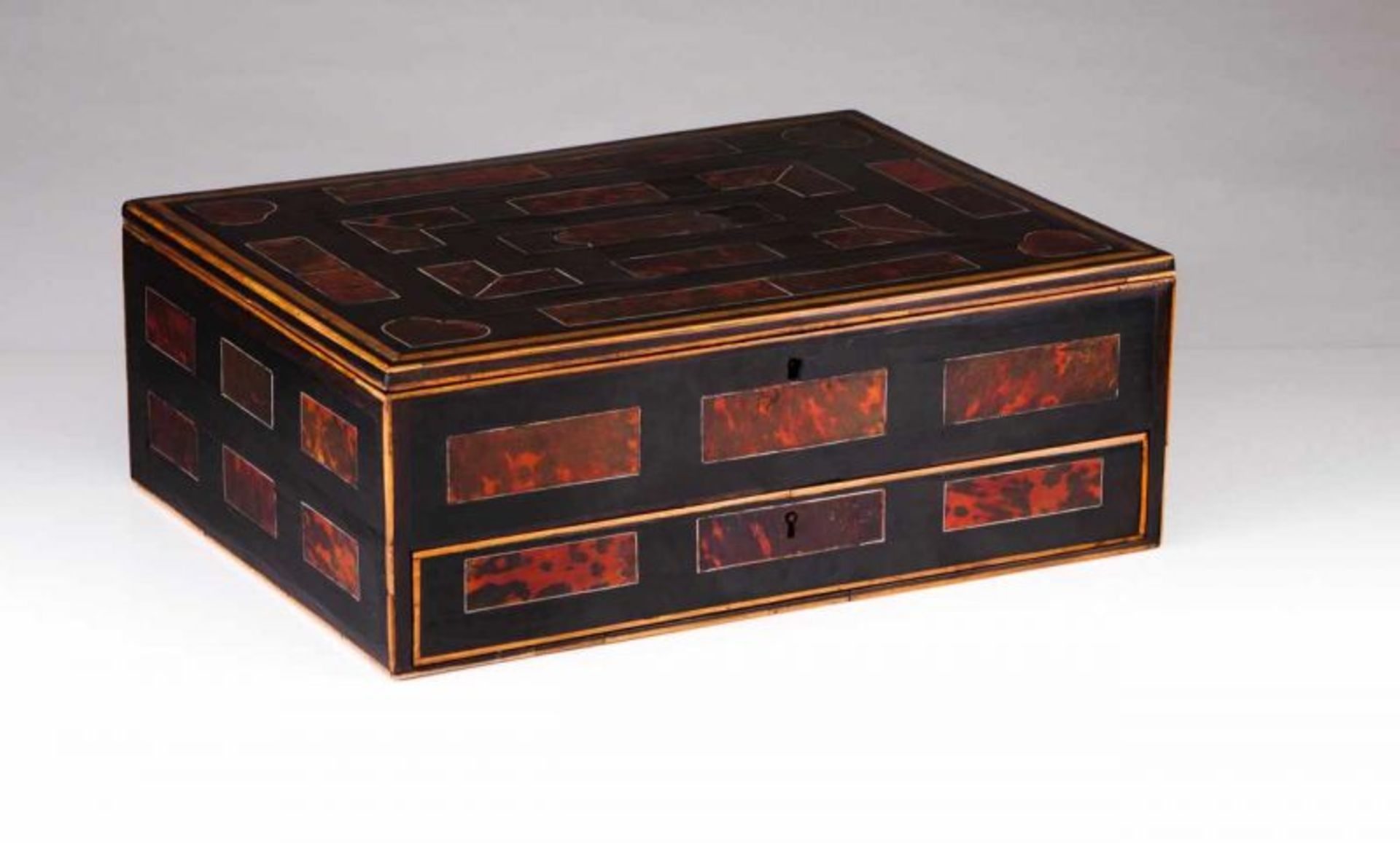 A 19th century Mannerist travel cabinet Ebonized wood decorated with tortoiseshell plaques and