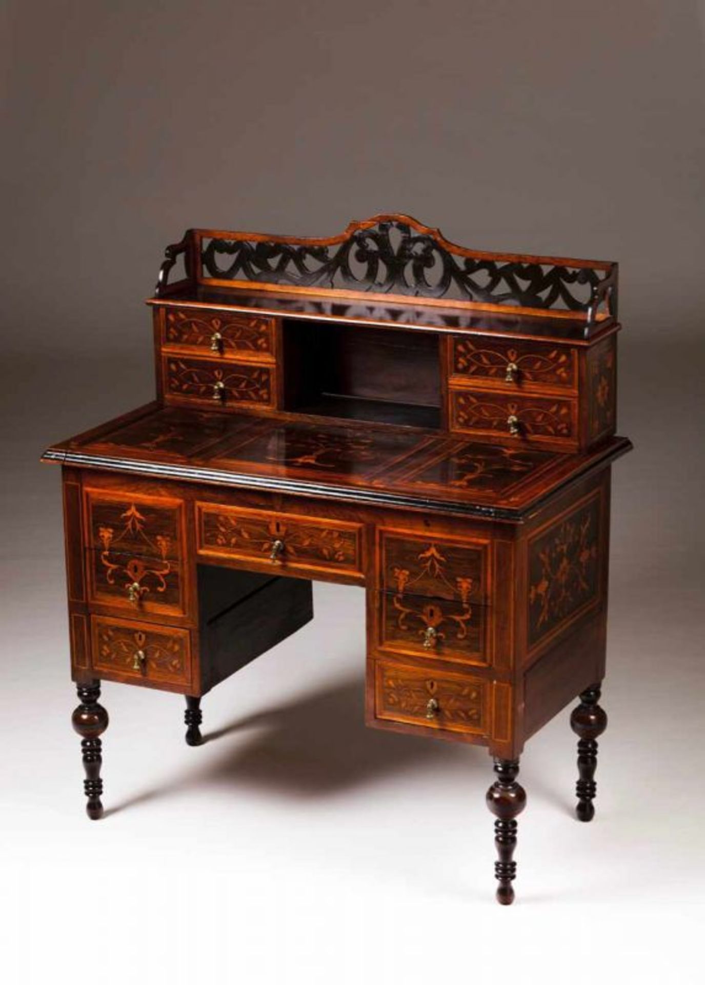 A D.Maria style bureau Rosewood with satinwood marquetry decoration depicting floral motifs Pierced