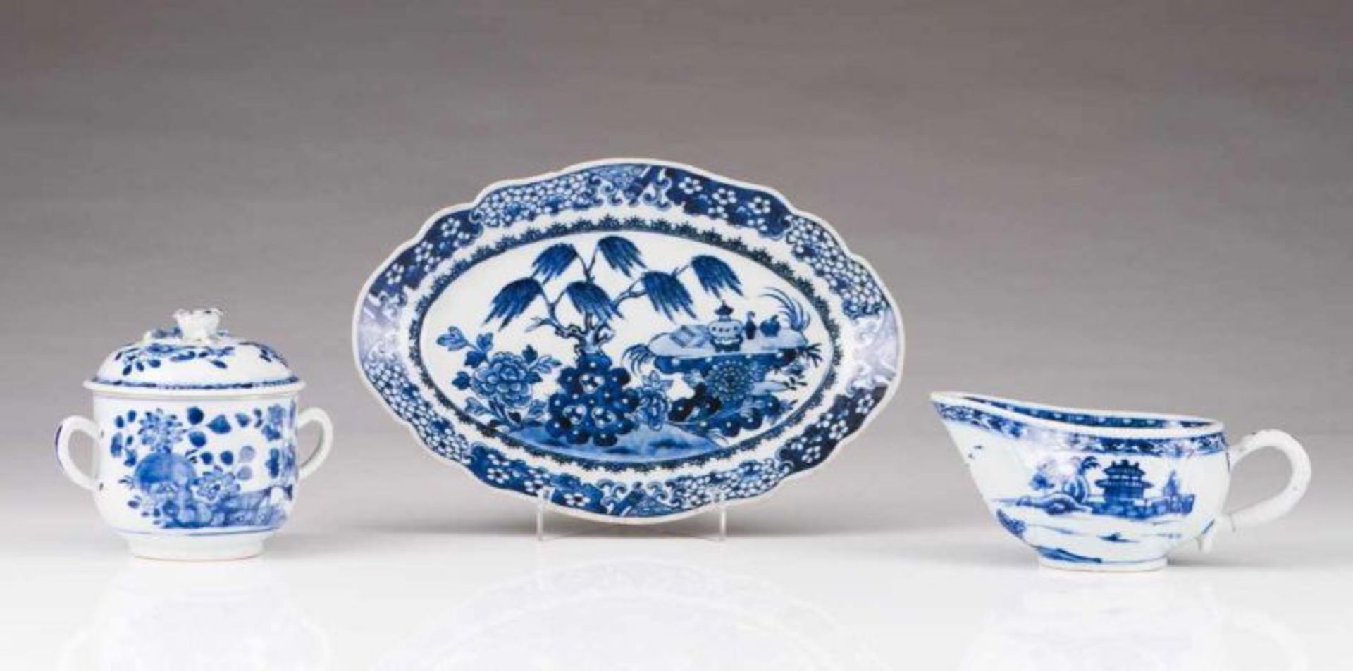 An oval dish Chinese export porcelain Blue decoration depicting garden with flowers and objects