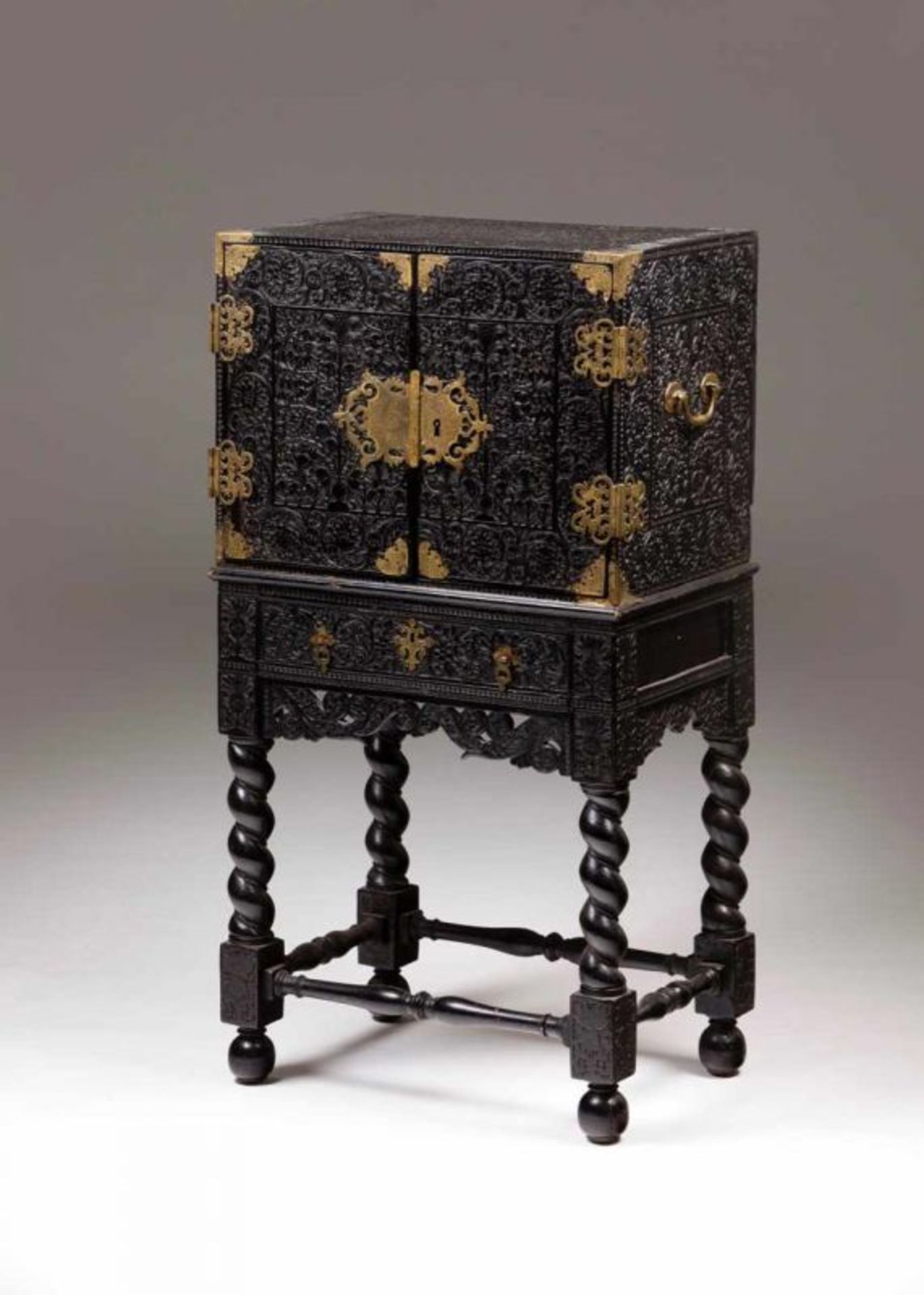 A Cingalo-Portuguese cabinet Carved ebony depicting Tree of Life and other floral motifs Upper part