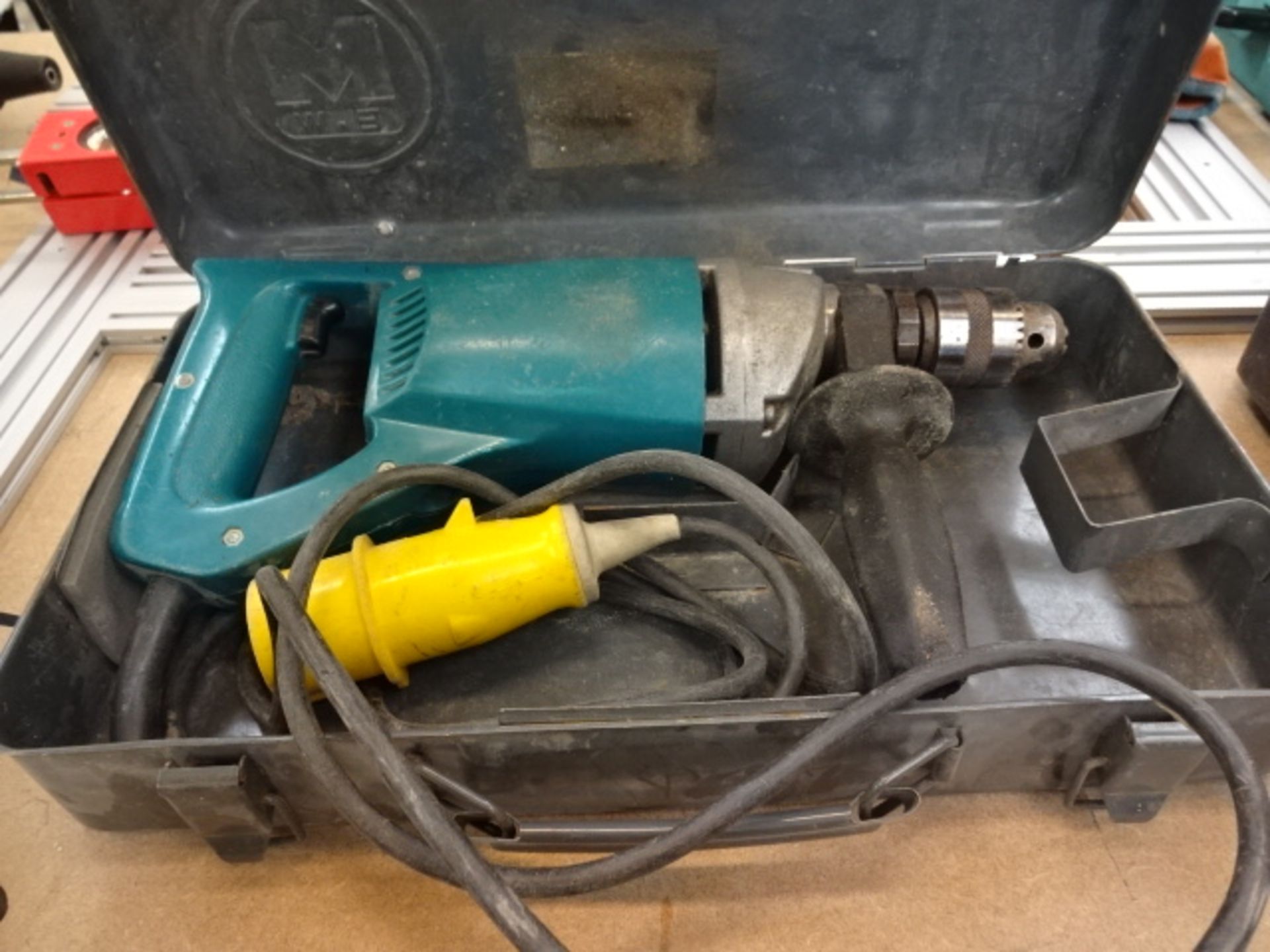 MAKITA 8419B 110v drill with case