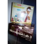 Original Merit Childs Chemistry set with contents and a Childs microscope both boxed