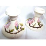 PAIR OF MOORCROFT CANDLESTICKS.