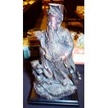 JAPANESE FIGURE OF DEITY. Japanese figure of deity with dragon at his feet.