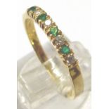 18CT GOLD EMERALD AND DIAMOND RING.