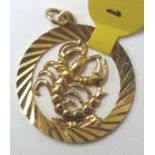 SCORPIO PENDANT. 9 ct gold circular Scor