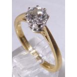 GOLD DIAMOND SOLITAIRE RING.