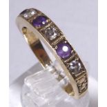 GOLD HALF ETERNITY RING.