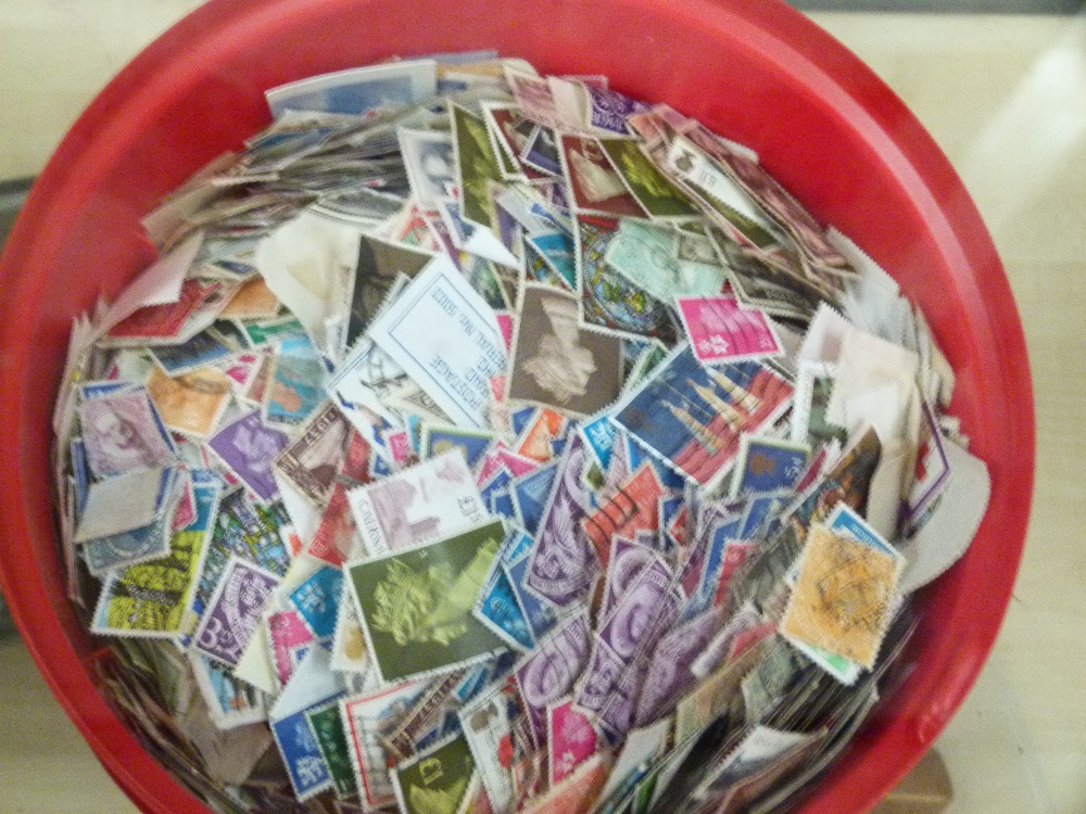 Box of mixed unsorted worldwide postage stamps