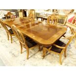 DINING TABLE AND CHAIRS. Inlaid mixed w