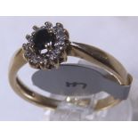 SAPPHIRE & DIAMOND CLUSTER RING. 9 ct go