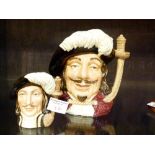 Two Royal Doulton character jugs depicting musketeers Athos and Porthos