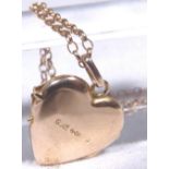 GOLD HEART LOCKET.