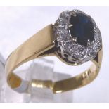 SAPPHIRE & DIAMOND CLUSTER RING.