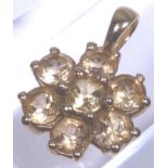 GOLD & TOPAZ PENDANT. 9 K gold Ouro Preto Imperial Topaz pendant, approximately 3.
