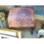 Upholstered sewing box stool with contents