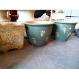 Five mixed sized glazed earthern ware garden planters