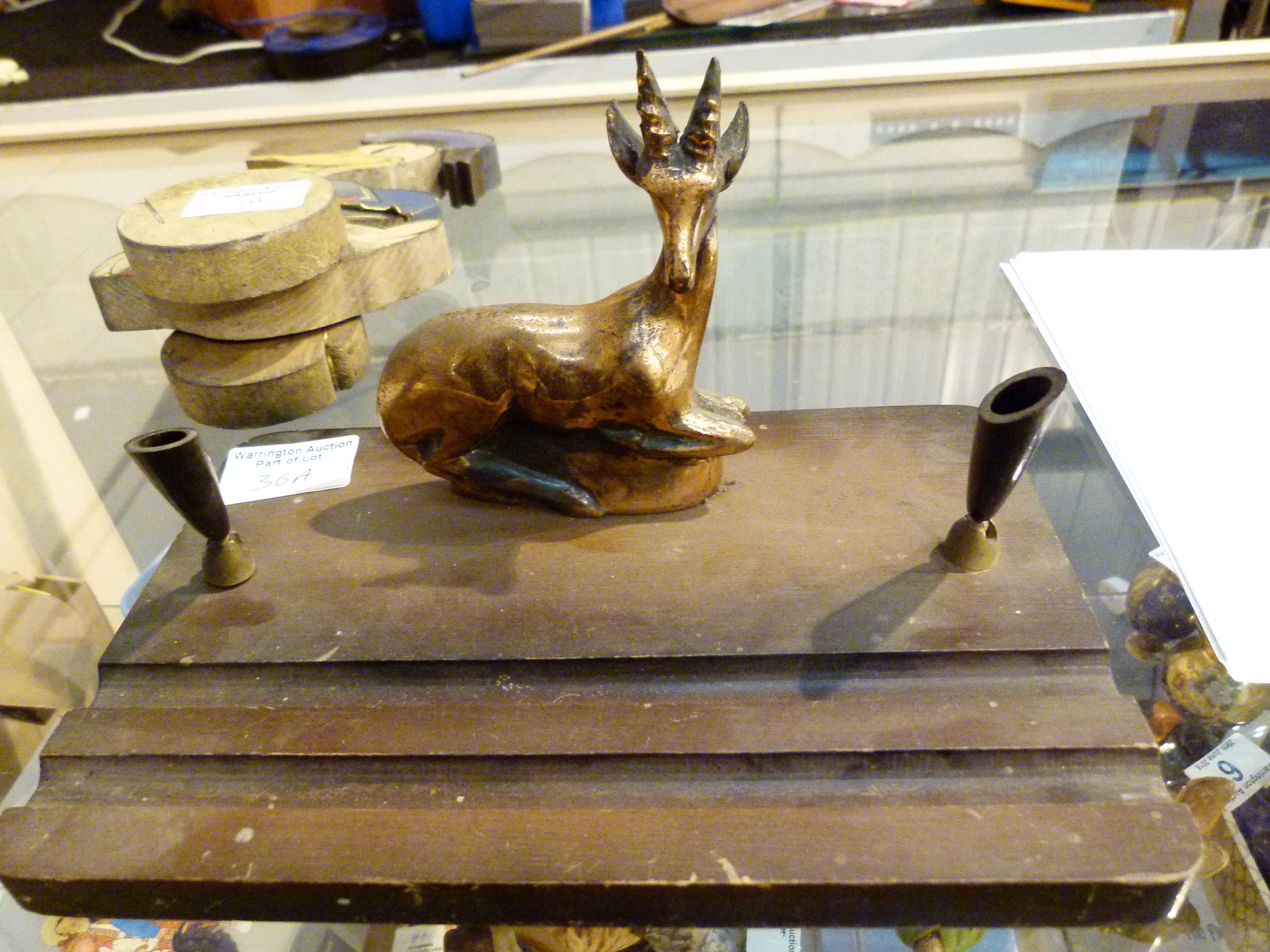 Wooden pen holder with a stag to the top