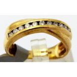 9 CT DIAMOND HALF ETERNITY RING.