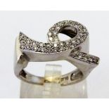 18 CT DIAMOND RING.