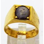 18CT GOLD RING. 18 ct gold set ring with purple stone, 9.
