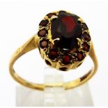 9 CT GOLD & GARNET RING. Gold garnet set ring size N 2.