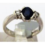 9 CT SAPPHIRE & DIAMOND RING.