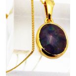 BLACK BOULDER OPAL PENDANT. Black Boulder Opal pendant with 14K gold vermeil chain, 2.