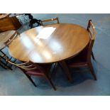 TEAK TABLE AND CHAIRS. Teak extending di