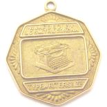 9 CT TYPEWRITER MEDAL.