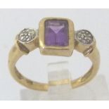 9 CT AMETHYST RING.