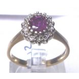 9 CT RUBY & DIAMOND RING. 9 ct gold ruby