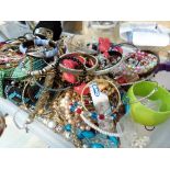 Tray of unsorted costume jewellery