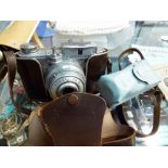 Leather cased vintage Kovoll camera with flash attachment