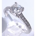 18 CT DIAMOND RING.